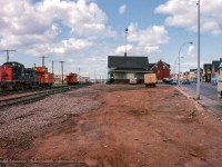 CN RSC13 1730 rests with its wooden van across from the station at Summerside PEI. Built in 1927 as the third station for the village, it remains preserved onsite today, with the former rail line now the Confederation Trail.
<br><br><i>Donald Coulman Photo, Jacob Patterson Collection Slide.</i>