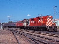 The Montreal section of the Canadian is eastbound into North Bay on a warm summer day.
<br><br><i>Donald Coulman Photo, Jacob Patterson Collection Slide.</i>
