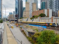 VIA 45 from Ottawa approaches Toronto Union Station alongside ongoing construction for Union Station Rail Corridor expansion on the east end of the station.  Two tracks are slated to be built here, in addition to expansions at Don and Wilson yards about a half mile behind the photographer.