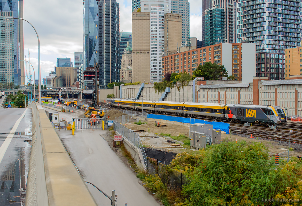 VIA 45 from Ottawa approaches Toronto Union Station alongside ongoing construction for Union Station Rail Corridor expansion on the east end of the station.  Two tracks are slated to be built here, in addition to expansions at Don and Wilson yards about a half mile behind the photographer.