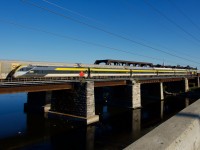 VIA 624 is passing CN 271 as it approaches the island of Montreal. Cab car VIA 2307 brings up the rear.