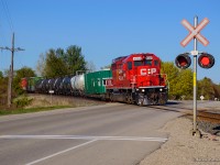Working west along the Galt Sub, CPKC's weed spray train rounds the curve out of Drumbo.