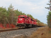 A loaded ballast train heads south towards Spence to unload.