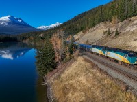 The eastbound Canadian skirts the shore of Yellowhead Lake, on a beautiful fall morning. 