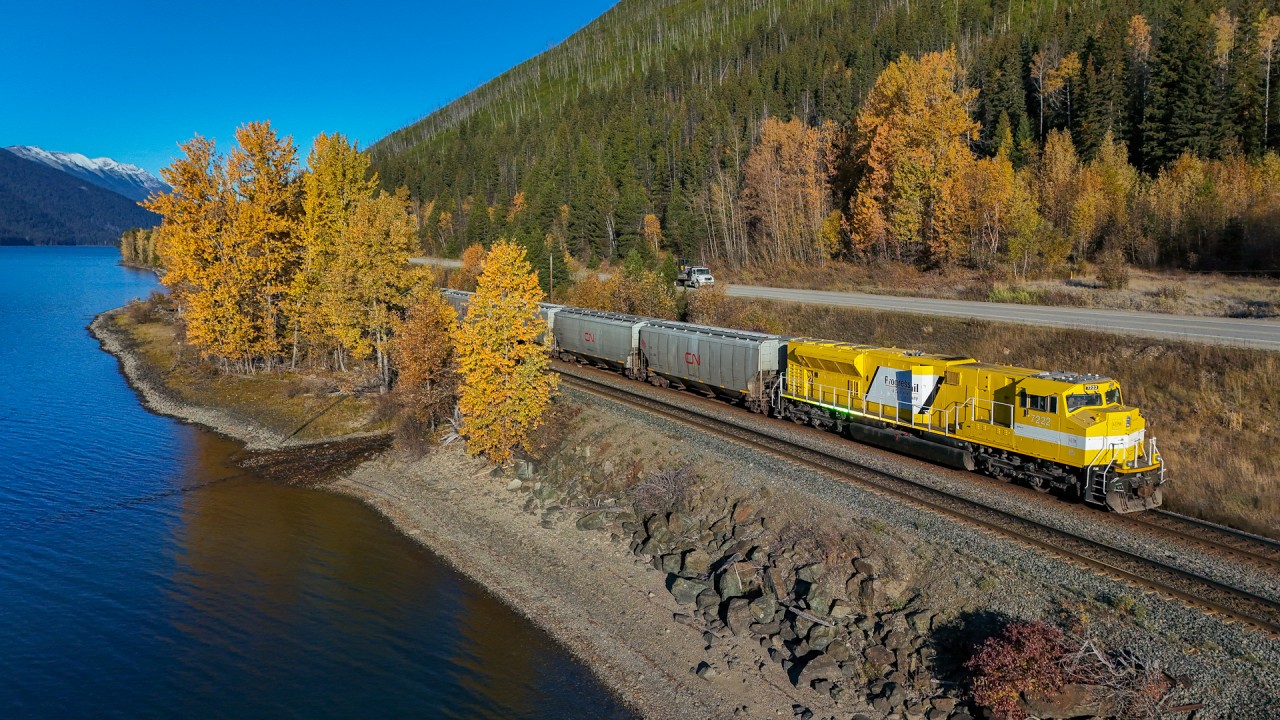 With the last of the fall colours on display, EMDX 7222 shoves G 81352 13 along the shores of Moose Lake. Having recently conquered Yellowhead Pass, this Grande Prairie to North Vancouver grain drag will soon enter the Robson Sub on the former GTP mainline.