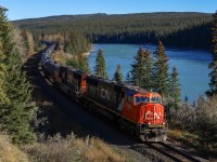 Classic power (for 2025!) leads a 98 car LPG train along the shores of the Athabasca River, as U 76151 13 transitions from the foothills to the Rocky Mountains. 