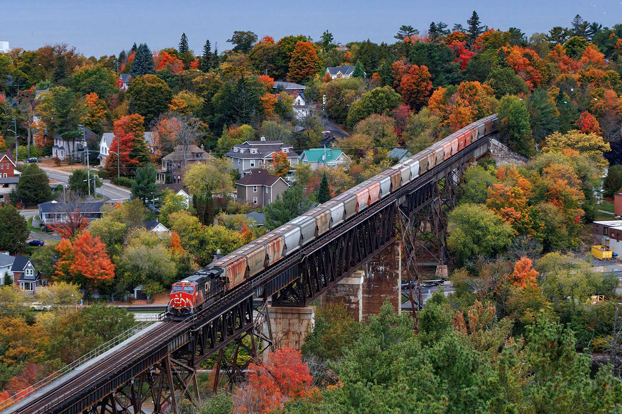 Faking my dream of southbounds running on CP, 731 with 182 potash empties return to Saskatchewan late in the afternoon as the colours in Parry Sound approach their peak. Thanks for the DPU being nose out.