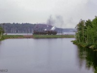Just after <a href=https://www.railpictures.ca/?attachment_id=54727>the southbound Canadian</a> passed, CNR 6167 is seen across the water at South Parry undergoing servicing before <a href=https://www.railpictures.ca/?attachment_id=52654>returning to Toronto.</a>

<br><br><i>Scan and editing by Jacob Patterson.</i>