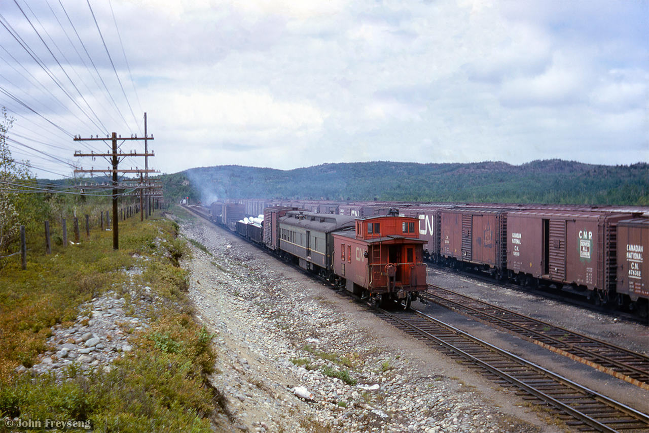 Tri-weekly mixed train M217 departs Capreol for Foleyet behind RS18 3739. Running west on Monday, Wednesday, and Fridays, the train will return east as M218 on Tuesday, Thursday, and Saturdays.

M217 approaching
At the station

Scan and editing by Jacob Patterson.