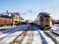 Stainless steel Budd consists shine under the sun at Sudbury's CPR station, as both section of the Canadian wait to depart for their respective destinations.  At left, Tweedsmuir Park brings up the rear of train 2, the Montreal section, behind CPR 1414, 8529, 8507.  At right, Prince Albert Park trails train 12, the Toronto section behind CPR 1410, 1913. 

<br><br><a href=https://www.railpictures.ca/?attachment_id=54409>#2 arriving</a>

<br><br><i>Scan and editing by Jacob Patterson.</i>