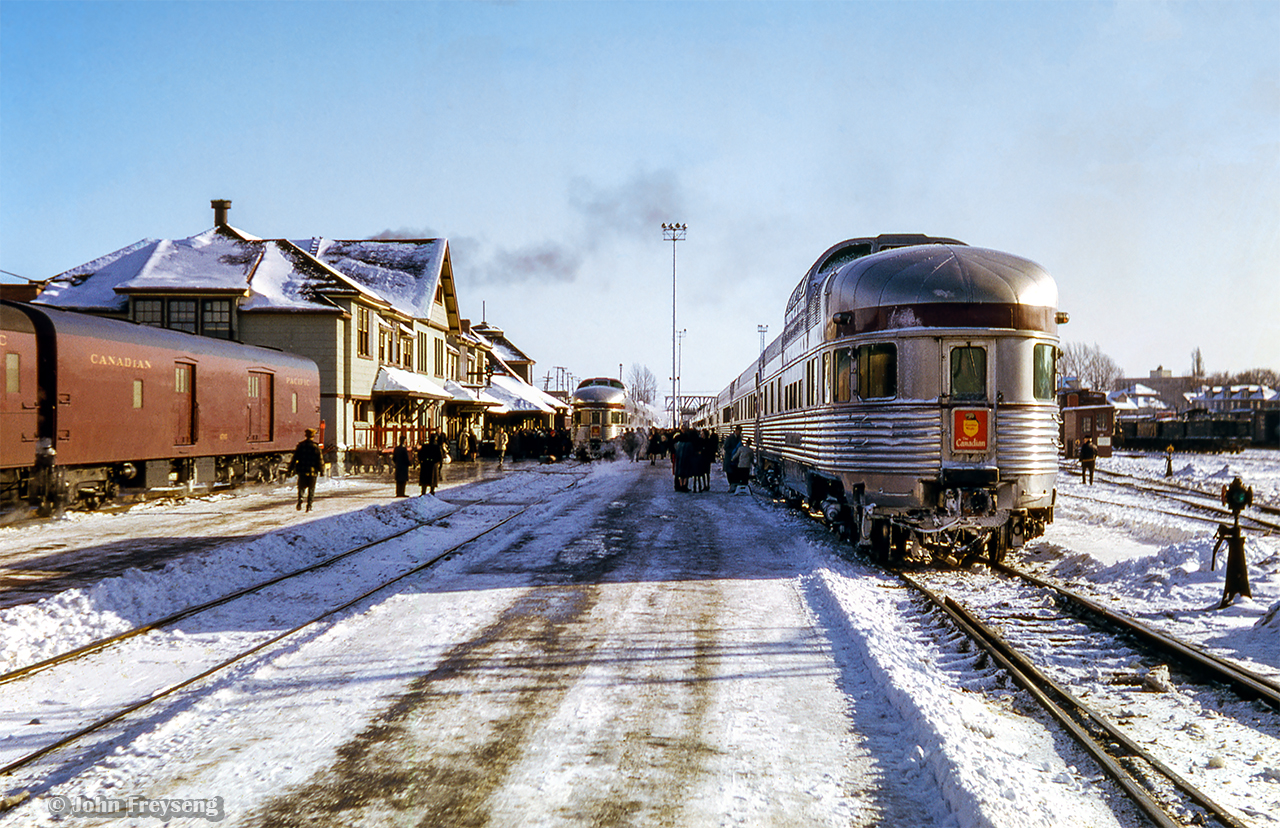 Stainless steel Budd consists shine under the sun at Sudbury's CPR station, as both section of the Canadian wait to depart for their respective destinations.  At left, Tweedsmuir Park brings up the rear of train 2, the Montreal section, behind CPR 1414, 8529, 8507.  At right, Prince Albert Park trails train 12, the Toronto section behind CPR 1410, 1913. 

#2 arriving

Scan and editing by Jacob Patterson.