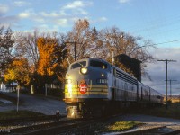 The weekend of October 23 & 24, 1965 saw the Upper Canada Railway Society run an excursion on each of the class one railways. The Saturday trip running on the Canadian Pacific behind CPR E8A 1802 departed Toronto Union station for Hamilton's TH&B Hunter Street station via the Oakville Sub, before heading up to Guelph Junction, Streetsville, and north to Orangeville before returning to Union Station. Here, the train makes a runpast at Inglewood, crossing the diamond with the CNR Beeton Sub.
<br><br><i>Scan and editing by Jacob Patterson.</i>