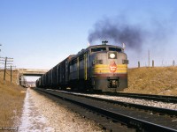 A westbound extra out of Agincourt yard for Mactier passes beneath the 401 along the Belleville Sub.<br><br><i>Scan and editing by Jacob Patterson.</i>