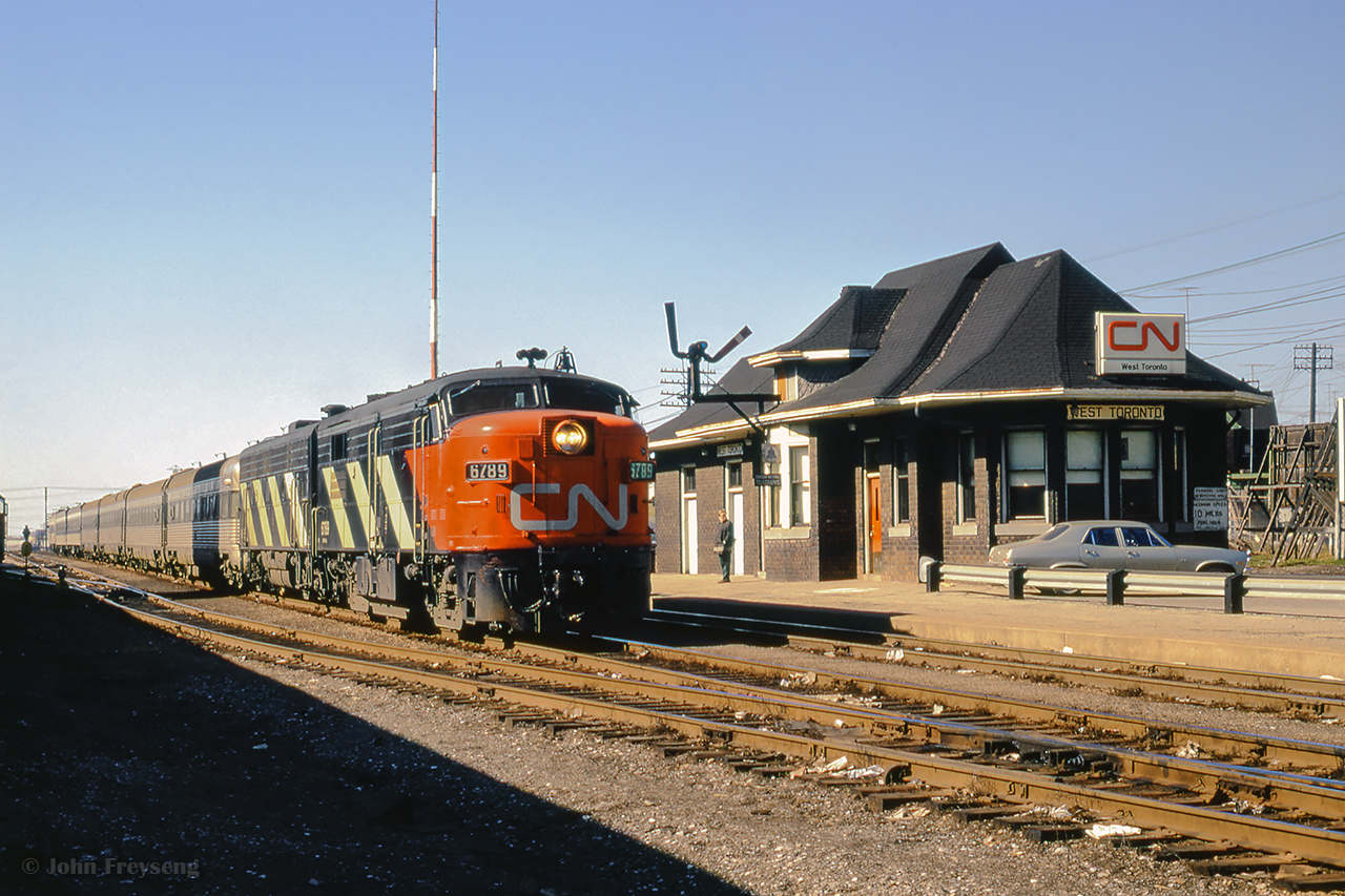Sarnia - Toronto train 154 passes CN's West Toronto station, roughly ten minutes from arrival at Union Station.

Scan and editing by Jacob Patterson.