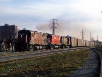 A spring evening finds three C424s eastbound along the North Toronto Sub, approaching Yonge Street.<br><br><i>Scan and editing by Jacob Patterson.</i>