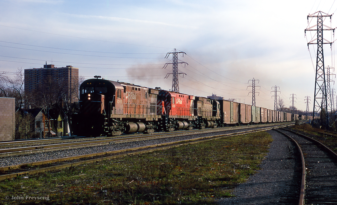 A spring evening finds three C424s eastbound along the North Toronto Sub, approaching Yonge Street.

Scan and editing by Jacob Patterson.