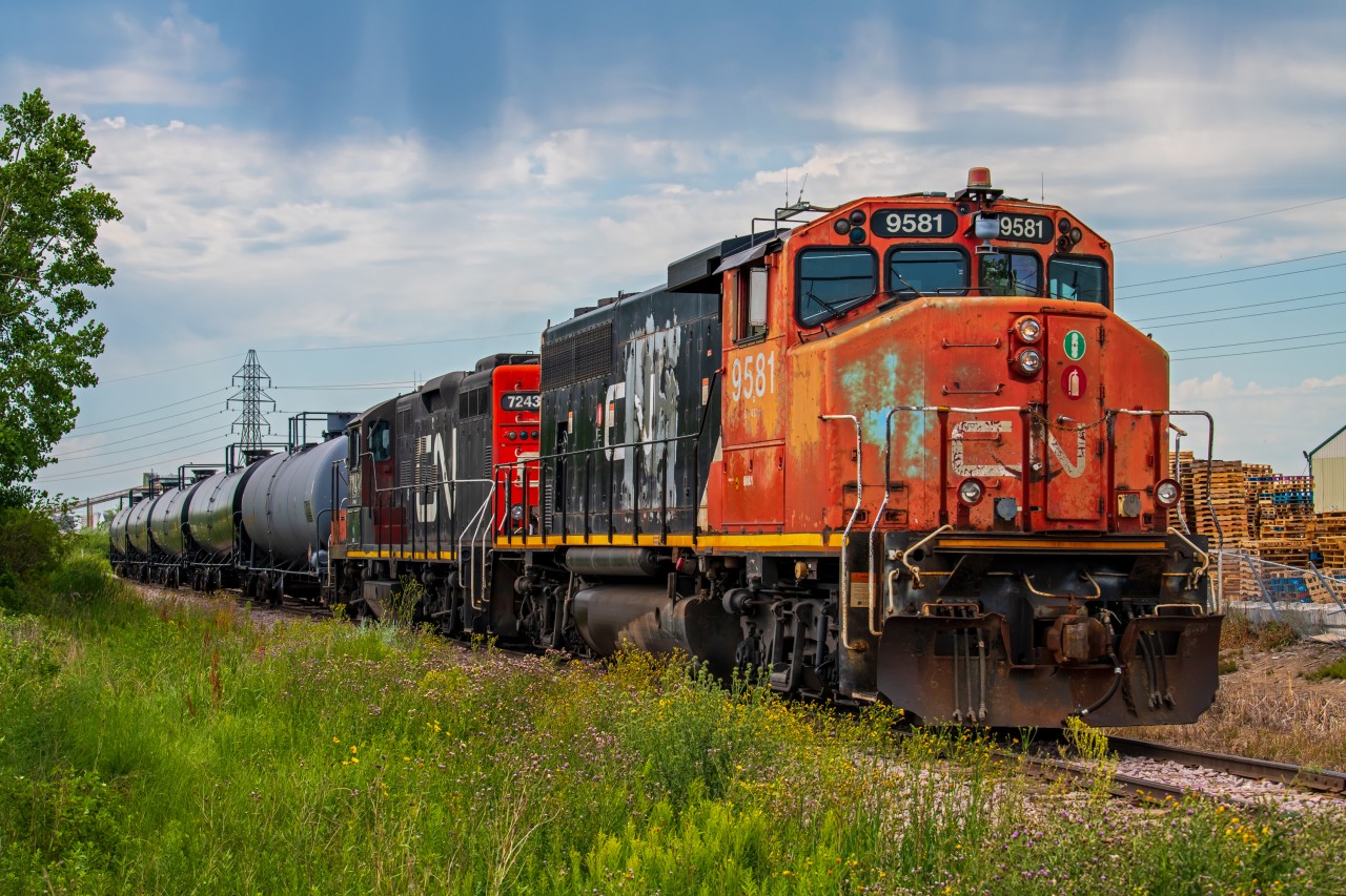 CN 9581 leading the way, while switching tanker cars out from the local Shell terminal