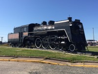 Steam locomotive QNSL 702 seen on display near the railroad offices in Sept-Iles, back on the morning of September 4, 2015. Not a cloud in the sky.