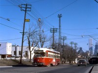TTC PCC 4324 (A6 class, CC&F 1947) climbs the dip from under the King Street railway underpass, heading westbound at Atlantic Ave. on a King streetcar run for Dundas West Station. One of CPR's Parkdale Yard lighting towers is visible near the tracks, as well as the usual downtown Toronto office towers beyond. On the left were the Consolidated Fastfrate offices (note the rear of a "CF" trailer), that were once located at the upper part of CP's Parkdale Yard, before they moved to the new shed/warehouse along St. Clair Avenue at Runnymede.
<br><br>
<i>Original photographer unknown, Dan Dell'Unto collection slide.</i>