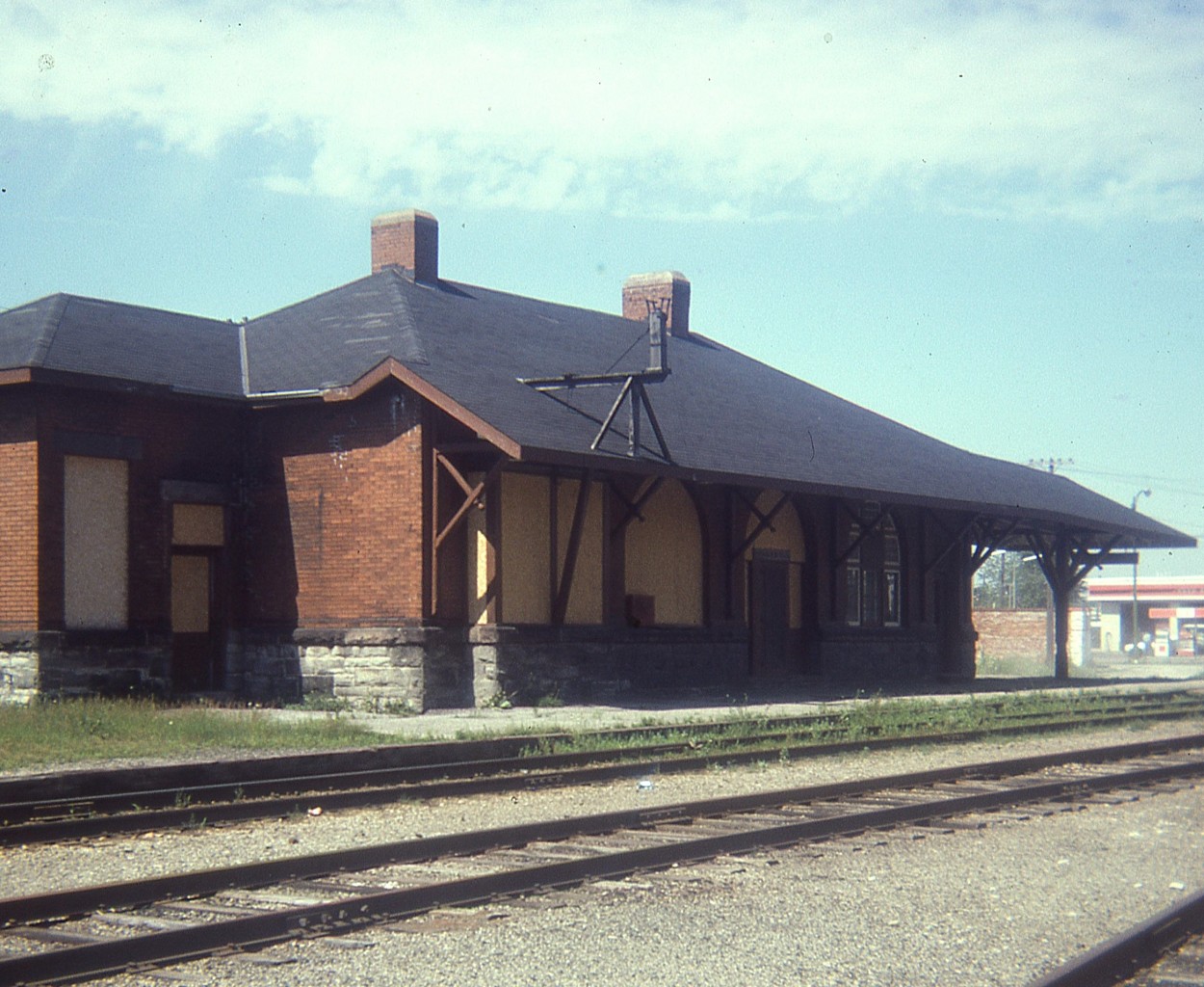 There certainly was a lot of chatter amongst the fans when the old GTR/CN station in Ingersoll was allowed to deteriorate to the point it had to be demolished a few years ago.  However, the CP station that used to be in town has been pretty much forgotten.
It used to sit on the west side of now what is the Ontario Southland track about west and a bit north of the landmark St. Paul's Presbyterian church in town. It was brick, constructed by the CPR back in 1908/09 and unfortunately was demolished in 1976 in order to facilitate sewer construction. The land, after nearly 50 years, is still vacant.  Too bad. She was a well-built structure and certainly could have been repurposed given her prime location in the downtown.