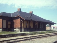 There certainly was a lot of chatter amongst the fans when the old GTR/CN station in Ingersoll was allowed to deteriorate to the point it had to be demolished a few years ago.  However, the CP station that used to be in town has been pretty much forgotten.
It used to sit on the west side of now what is the Ontario Southland track about west and a bit north of the landmark St. Paul's Presbyterian church in town. It was brick, constructed by the CPR back in 1908/09 and unfortunately was demolished in 1976 in order to facilitate sewer construction. The land, after nearly 50 years, is still vacant.  Too bad. She was a well-built structure and certainly could have been repurposed given her prime location in the downtown.