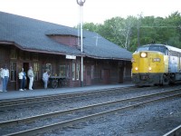 There were still a few people standing around waiting for the Toronto section of The Canadian on this warm June evening.  Don't know what happened, but the early afternoon train did not show up until 2045 hrs. Fortunately for me, it was still light out. Just barely.  Here we see southbound VIA 6791 (and 6634) making the station stop. It was very unusual to see an MLW (FPA-4) along this route. Almost always we were treated to GMDs.