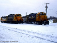 ONT GP38-2 1802 and ONT GP38-2 1800 are working at Cochrane Yard on a very cold winter morning.