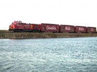 Well, it is almost CP Holiday Train time again. Since I already know I will be too lazy to fight the QEW and Skyway bridge traffic come that day this year, I guess I will cop out by posting an image from 14 years back.
This is CP 9824 leading the train over the causeway at Mountsberg; just before sundown, as it is usually dark by the train sets up in Cambridge.
Not sure if the south side here at Mountsberg is accessible any more. I shot over here to avoid the pole line.
Changes at the park and new fencing might now have this location off limits.
