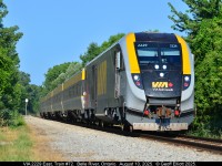 VIA Charger #2229 leads Train #72 through Belle River, Ontario on a sunny August 10th morning.  