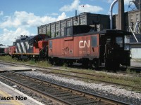 CN GP9RM 4132 and caboose 79513 are pictured awaiting their next assignment at Kitchener, Ontario across from the VIA Rail station and CN office. It likely would be that day’s 15:30 Job and a trip to the Budd Plant on the Huron Park Spur. 
