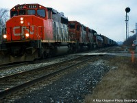 CN SD40-2(w) 5354 leads 333 from Mac Yard to CR Frontier Yard as they climb the grade at mile 6.3 on the CN Grimsby Sub at Garner Rd.
This train was renumbered to 339 after the CR merger on June 1, 1999