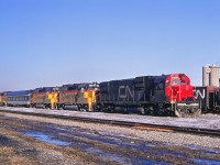 The winter snows are melting as CN managers evaluate a trio of C&O GP40-2s (4182, 4181, and 4184), using C630Ms 2001 (near), 2000 (far), and CN Research car 15015. The tests must have been successful, for CN ordered 268 similar units (delivered between 1974 and 1976) and eventually acquired 10 of GO Transit's 11 units. (Montreal Yard is an "educated guess" for the location; unfortunately I don't have the exact date or location of the photo.) According to the 2025 Canadian Trackside Guide, 59 GP40-2LWs and GP40-2Ws are still on the CN roster.