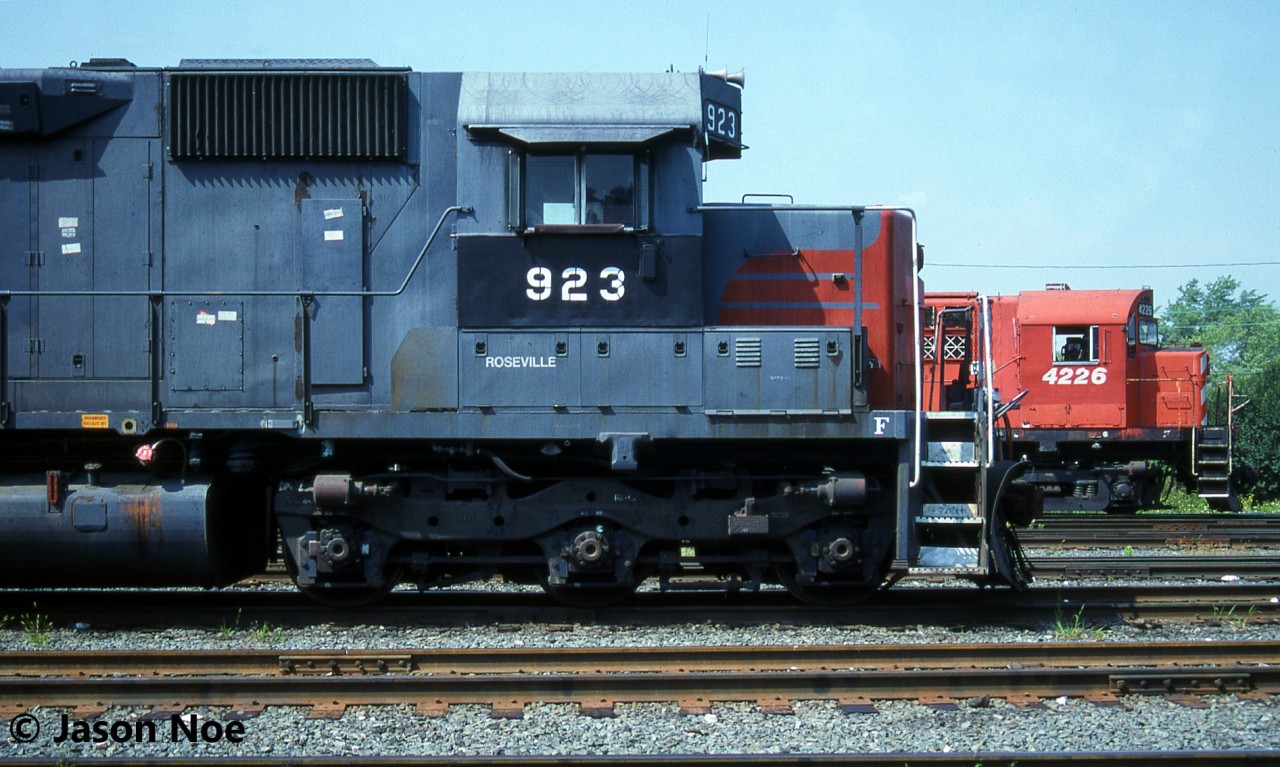 CP’s Aberdeen Yard in Hamilton, Ontario is a long way from Roseville, California, however HATX 923, which began life as Southern Pacific SD45 8807, is seen still proudly displaying its home shop designation despite being in the employ of a new owner. Now a part of CP’s massive mid-90’s lease fleet, HATX 923 is rubbing shoulders with CP C-424 4226, both awaiting their departures from Aberdeen Yard. Behind HATX 923 is CP SD40-2 5901 and trailing 4226 are SD40-2 786, leased Conrail SD40 0809, GP9u 8248 and C-424 4216.