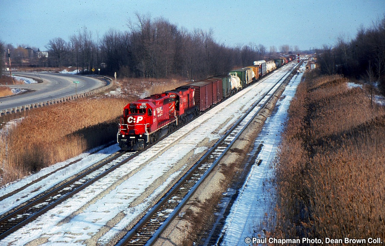 CP SD40-2 5673 and CP M630 4571 seen on a northbound through Brookfield.