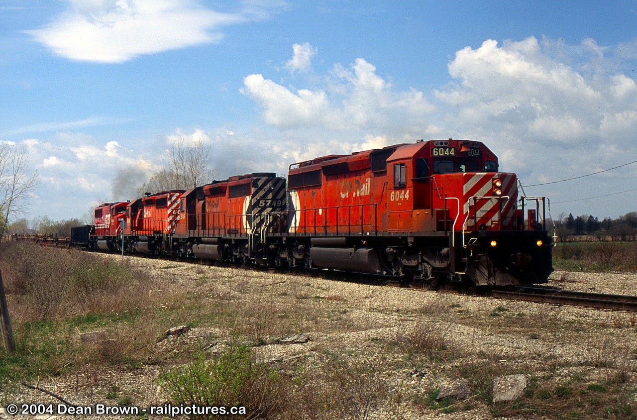 Southbound departing Welland with CP SD40-2 6014, CP SD40-2 5749, CP SD40-2 6043, and SOO SD60M 6059.
