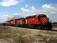 Southbound departing Welland with CP SD40-2 6014, CP SD40-2 5749, CP SD40-2 6043, and SOO SD60M 6059.