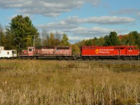 CP 9014 South looks sharp slowly pulling out of the siding at Palgrave after meeting 113 and picking up the Conductor with, not so sharp looking, van 420984 on the head end. I was very happy to see both the "Beaver Scheme" and the SD40-2F's make their own comebacks, but seeing one on the other travelling the CP mainline again is a bet I gladly lost!
