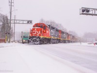 The first significant snowfall this season swirls around Guelph as CN L540 works in XV yard.  Shortly they'll head up to the north industrial park to work their customers with CN 4956 (ex BNSF 2082) in the lead.
