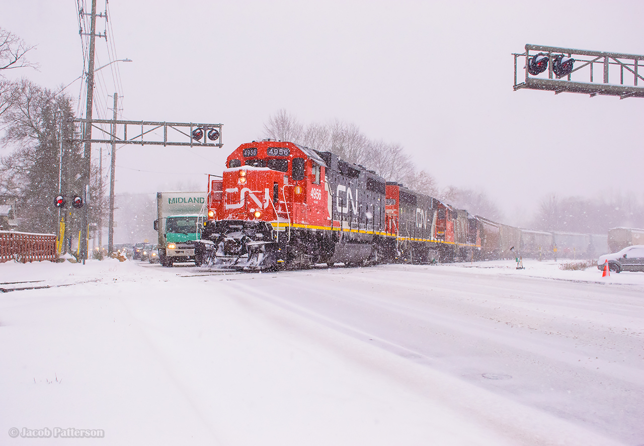The first significant snowfall this season swirls around Guelph as CN L540 works in XV yard.  Shortly they'll head up to the north industrial park to work their customers with CN 4956 (ex BNSF 2082) in the lead.