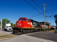CN 500 is on the Turcot Holding Spur to grab two cars as it crosses Place-Turcot.
