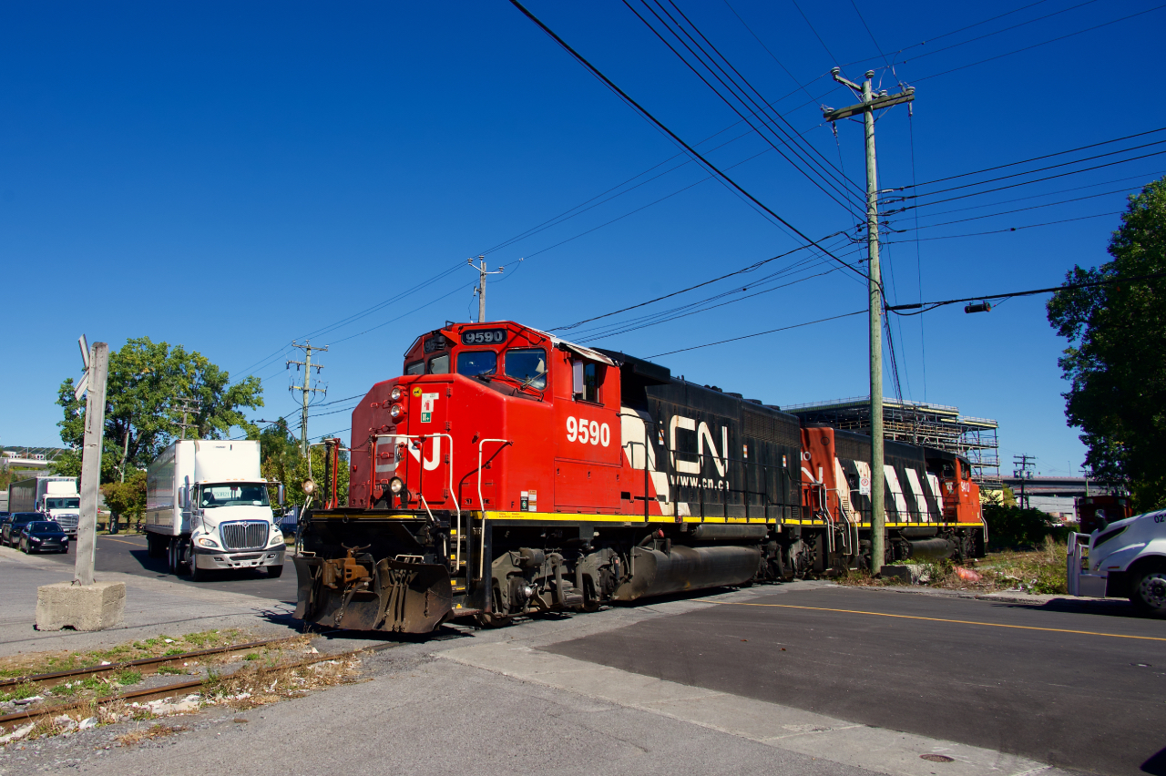 CN 500 is on the Turcot Holding Spur to grab two cars as it crosses Place-Turcot.