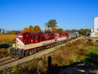 Clattering along jointed rails, OSR's GP7s growl through Mount Elgin en route to Tillsonburg.