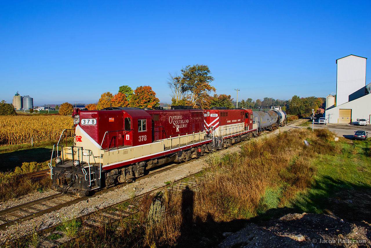 Clattering along jointed rails, OSR's GP7s growl through Mount Elgin en route to Tillsonburg.