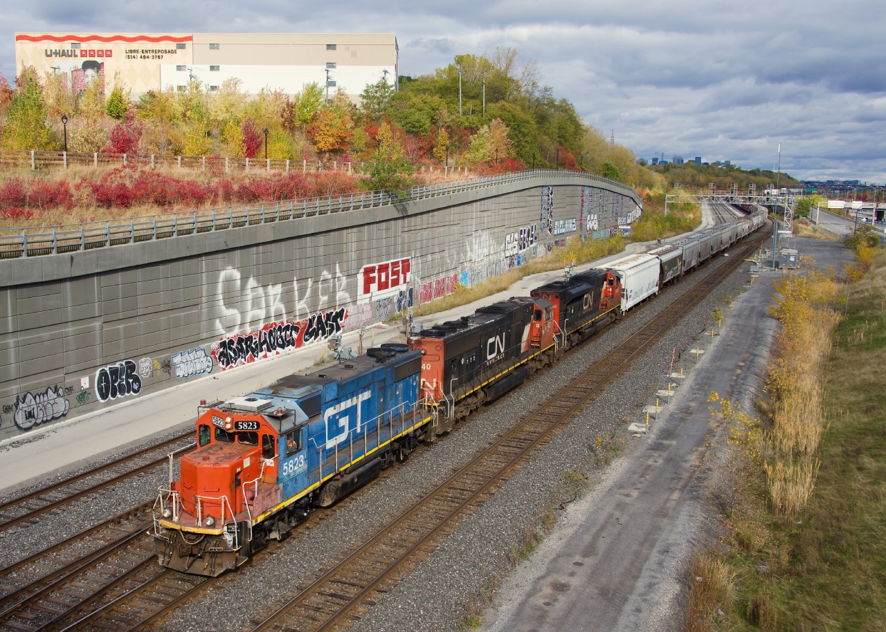 Proof that even in this day and age, you can still be pleasantly surprised when you're trackside. This past Saturday, CN 527 had CN 8888/CN 5740 for power, so when I saw that CN 527 was working Pointe St-Charles Yard the next day, I figured I would go and shoot it again. Imagine my surprise when they called out 'GTW 5823' on the scanner. The sun even mostly popped out when it passed me. With both units facing east and no way to wye the power at Southwark, evidently the crew grabbed any westwards facing leader they could get.