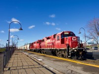 CPKC XRS-22 rockets through the EXO Station, on its way from Vaudreuil to Delson.