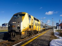 One of VIA Rail's nastier looking units leads a HEP-equipped VIA 35 away from Dorval Station.