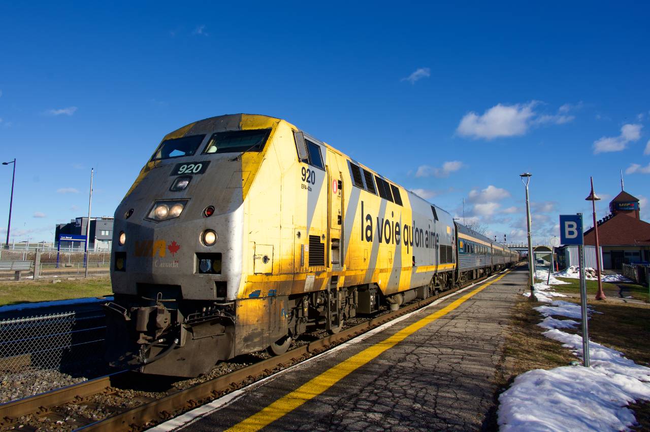 One of VIA Rail's nastier looking units leads a HEP-equipped VIA 35 away from Dorval Station.