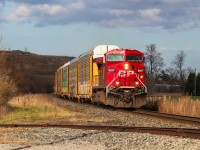 When's the last time you found a 20 year old locomotive this clean? CP 9817 races the edge of a cloud as it brings CP 731 around the bend at Dumfries Rd just west of Cambridge. 9817 was repainted in 2017 and has shone basically ever since. Its a welcome outlier amongst a fleet full of red turning purple or black GEs.