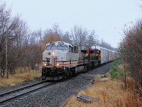 The old saying came to be true once again, the best trains come in crap weather. With light rain falling, the rare KCSM "Safety Starts Here" locomotive in ES44AC, KCSM 4859 leads KCS 4167 by mile 43.2 on CPKC 137. CPKC has been nice to us in the last week with the BNSF twenty fifty anniversary locomotive leading and now this. The old saying of "CPKC 137 could have anything" is once again living up to its reputation.