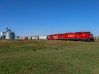 CP 9022 and CP 3140 spot the elevator at Wilkie. 